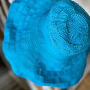 Wide brimmed turquoise sun hat